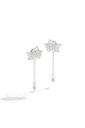 Close-up of The Papillon stud earrings, showcasing the delicate hollow butterfly silhouette in high-polish solid 925 sterling silver.