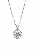 Close-up of The Aurelia pendant featuring a 1.0 carat moissanite surrounded by a cushion-shaped pavé halo in solid 925 sterling silver.