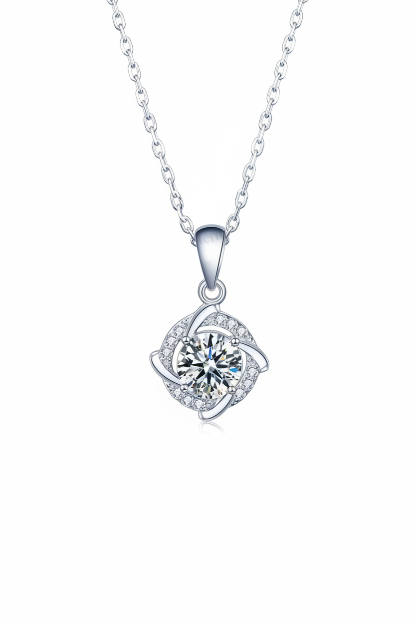 Close-up of The Nova pendant, featuring a 1.0 carat round moissanite stone centered inside a sharp square pavé halo in solid 925 silver.