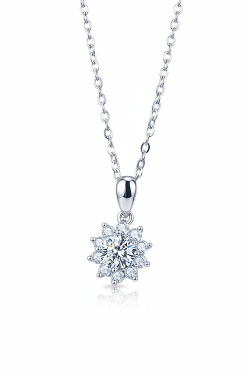Close-up of a 1.0 carat moissanite pendant with a floral pavé halo, set in solid 925 sterling silver.