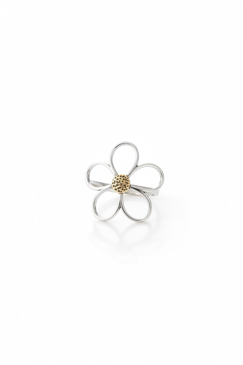 Delicate 925 sterling silver ring with a hollow-out clover floral design, minimalist handcrafted silver jewelry by Nura Label.