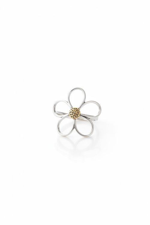 Delicate 925 sterling silver ring with a hollow-out clover floral design, minimalist handcrafted silver jewelry by Nura Label.