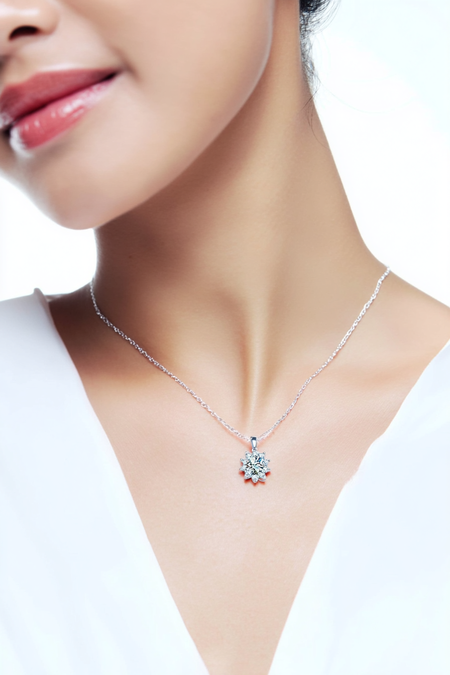 Close-up of a 1.0 carat moissanite pendant with a floral pavé halo, set in solid 925 sterling silver.