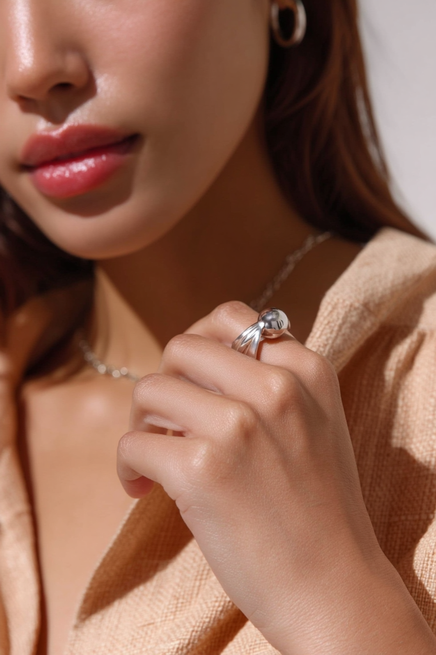 Minimalist 925 sterling silver ring with a large smooth polished sphere on a vintage band by Nura Label.