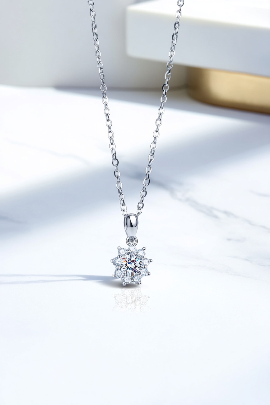 Close-up of a 1.0 carat moissanite pendant with a floral pavé halo, set in solid 925 sterling silver.