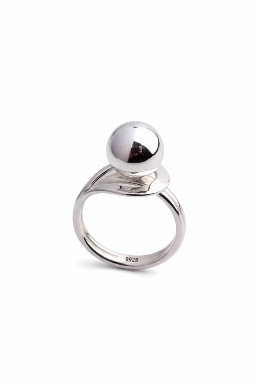 Minimalist 925 sterling silver ring with a large smooth polished sphere on a vintage band by Nura Label.