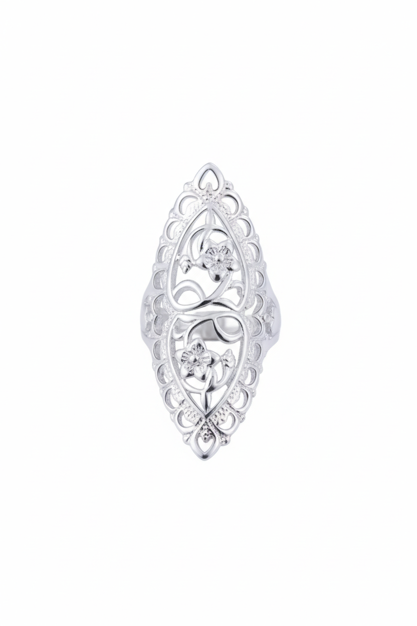 Intricate 925 sterling silver filigree shield ring featuring a hollow-out floral lace pattern, handcrafted statement jewelry by Nura Label.
