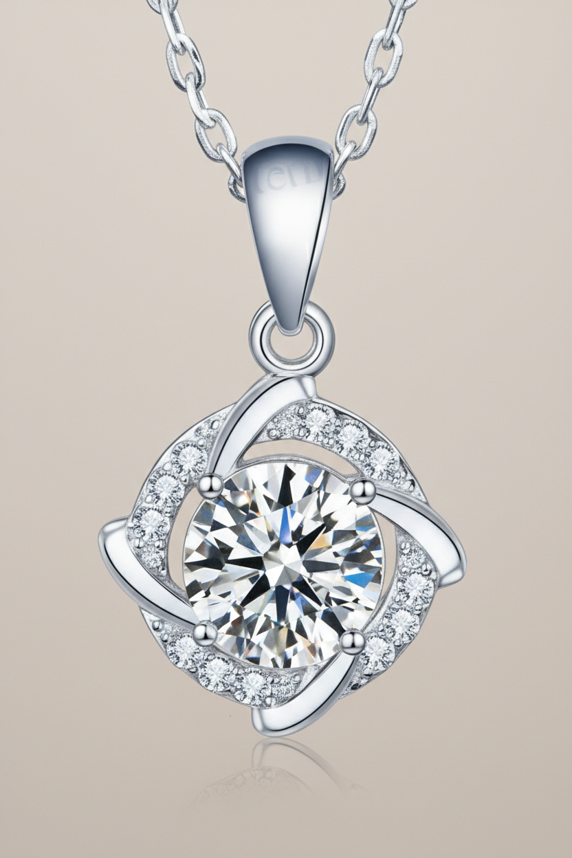 Close-up of The Nova pendant, featuring a 1.0 carat round moissanite stone centered inside a sharp square pavé halo in solid 925 silver.