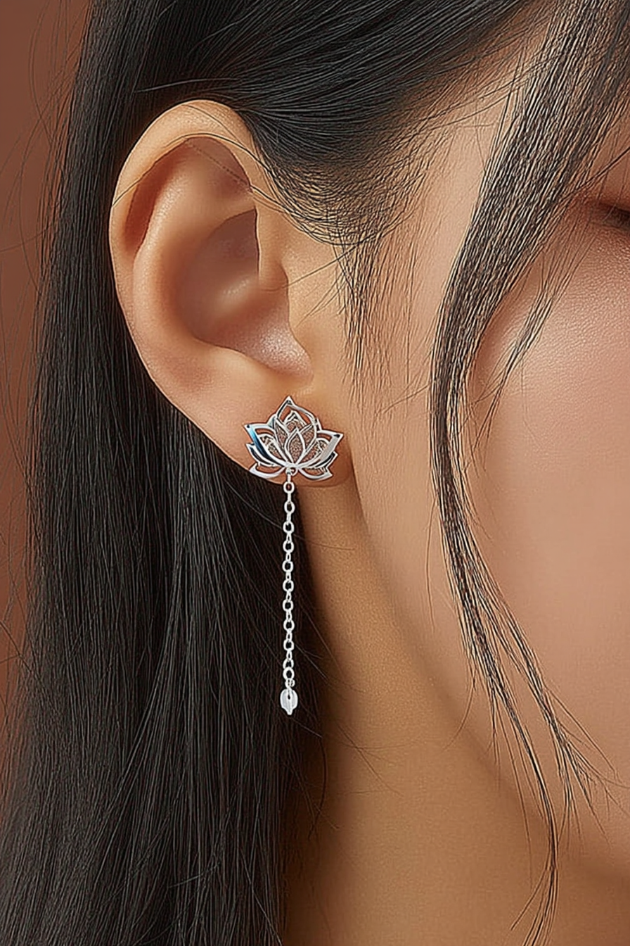 Close-up of The Papillon stud earrings, showcasing the delicate hollow butterfly silhouette in high-polish solid 925 sterling silver.