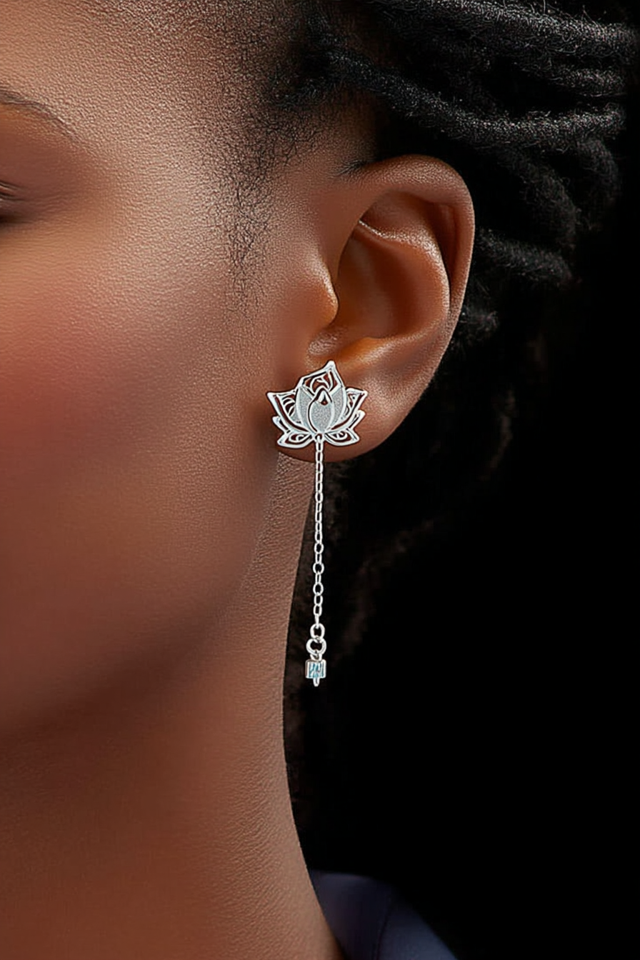 Close-up of The Papillon stud earrings, showcasing the delicate hollow butterfly silhouette in high-polish solid 925 sterling silver.